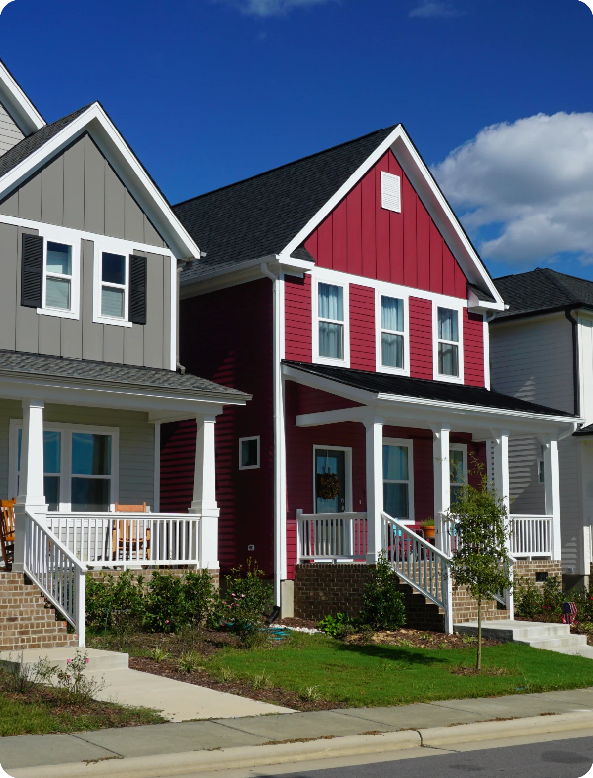 Modern suburban houses with vibrant facades.